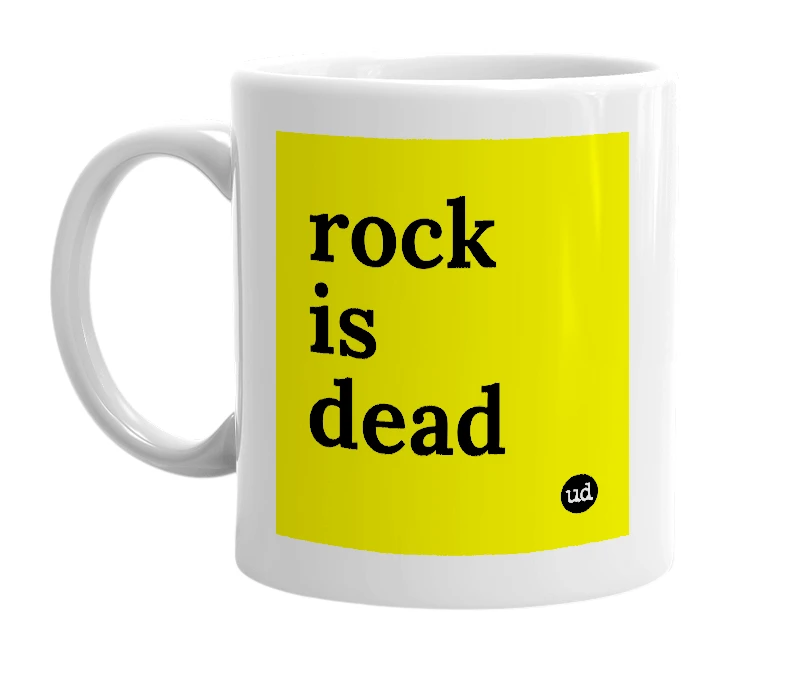 White mug with 'rock is dead' in bold black letters