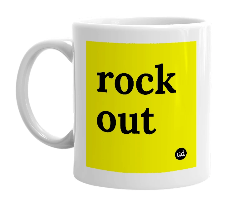 White mug with 'rock out' in bold black letters