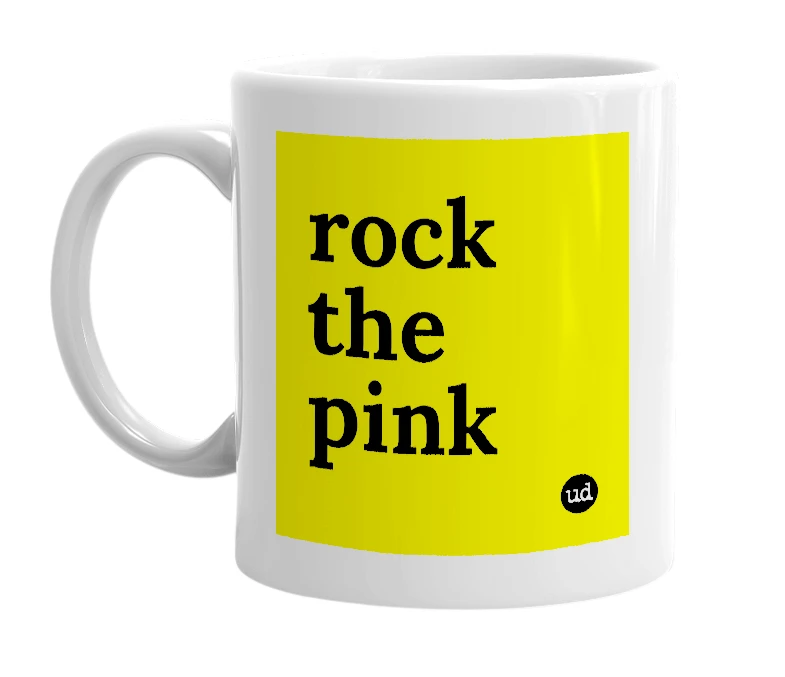 White mug with 'rock the pink' in bold black letters