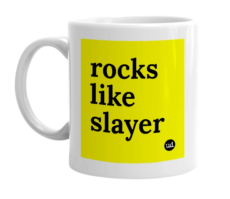 White mug with 'rocks like slayer' in bold black letters