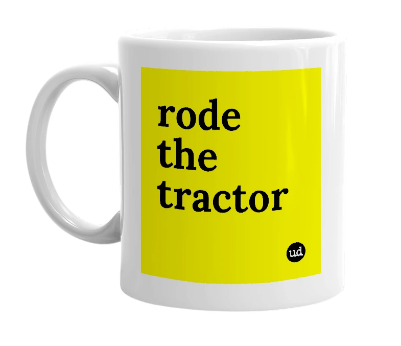 White mug with 'rode the tractor' in bold black letters