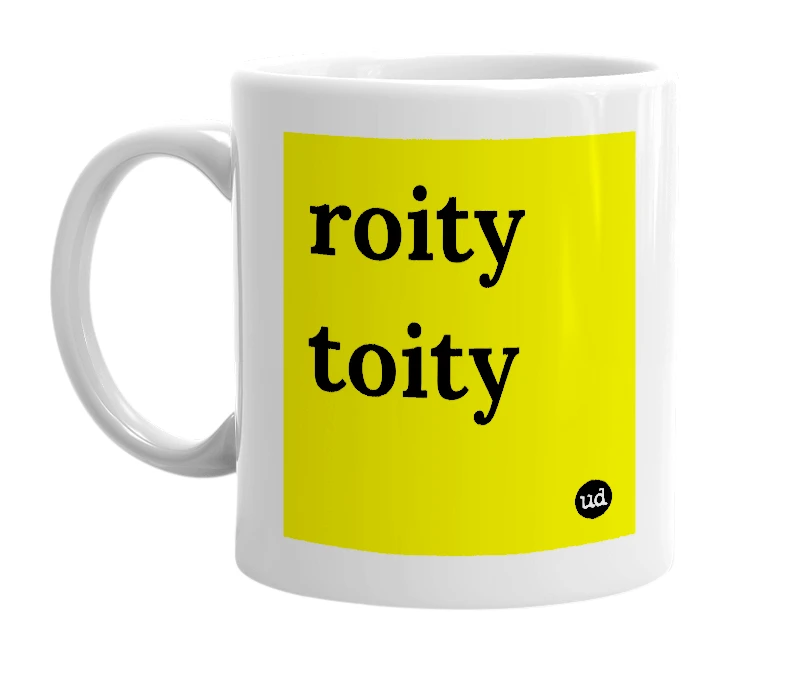 White mug with 'roity toity' in bold black letters