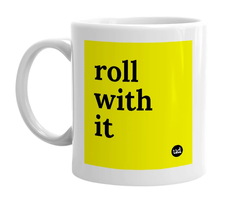 White mug with 'roll with it' in bold black letters
