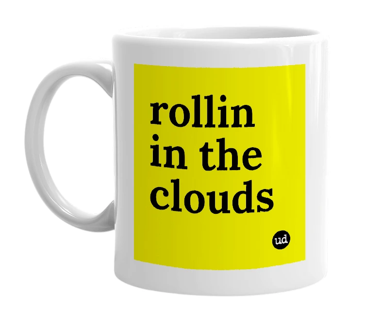 White mug with 'rollin in the clouds' in bold black letters