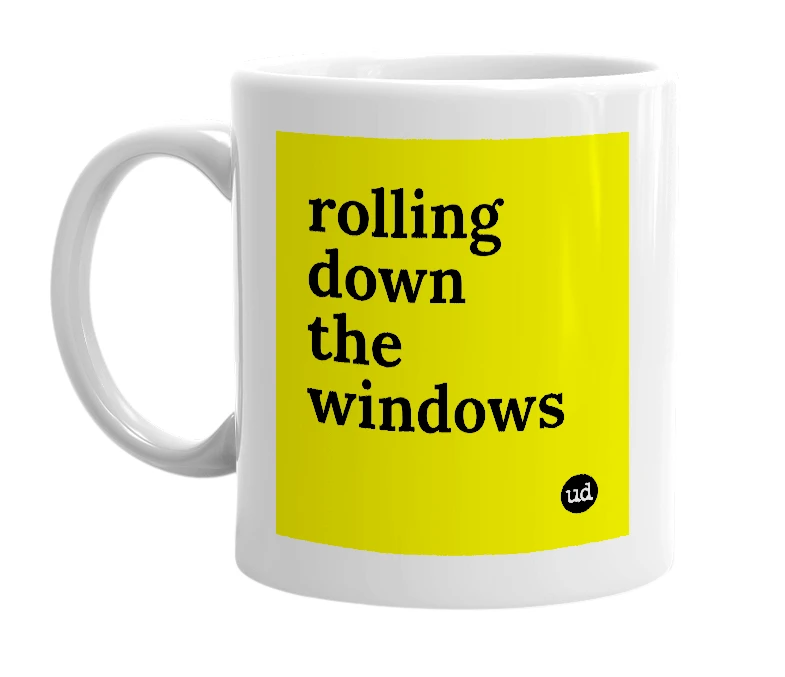 White mug with 'rolling down the windows' in bold black letters