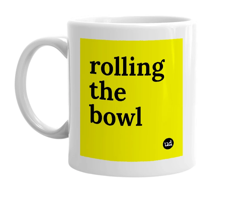 White mug with 'rolling the bowl' in bold black letters