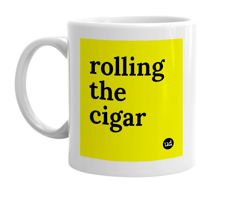 White mug with 'rolling the cigar' in bold black letters