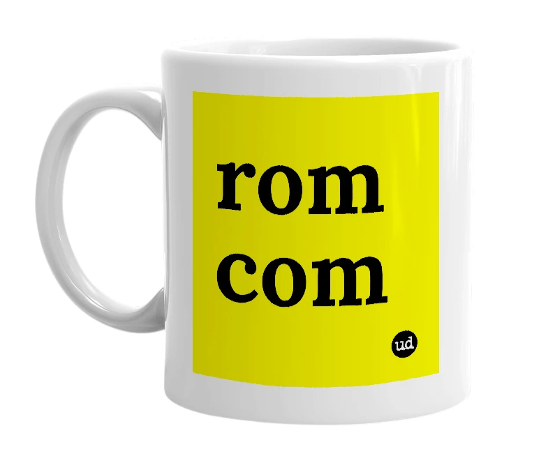 White mug with 'rom com' in bold black letters