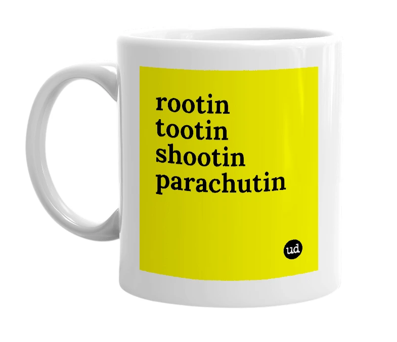 White mug with 'rootin tootin shootin parachutin' in bold black letters