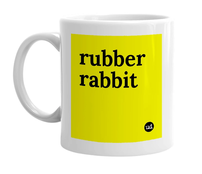 White mug with 'rubber rabbit' in bold black letters