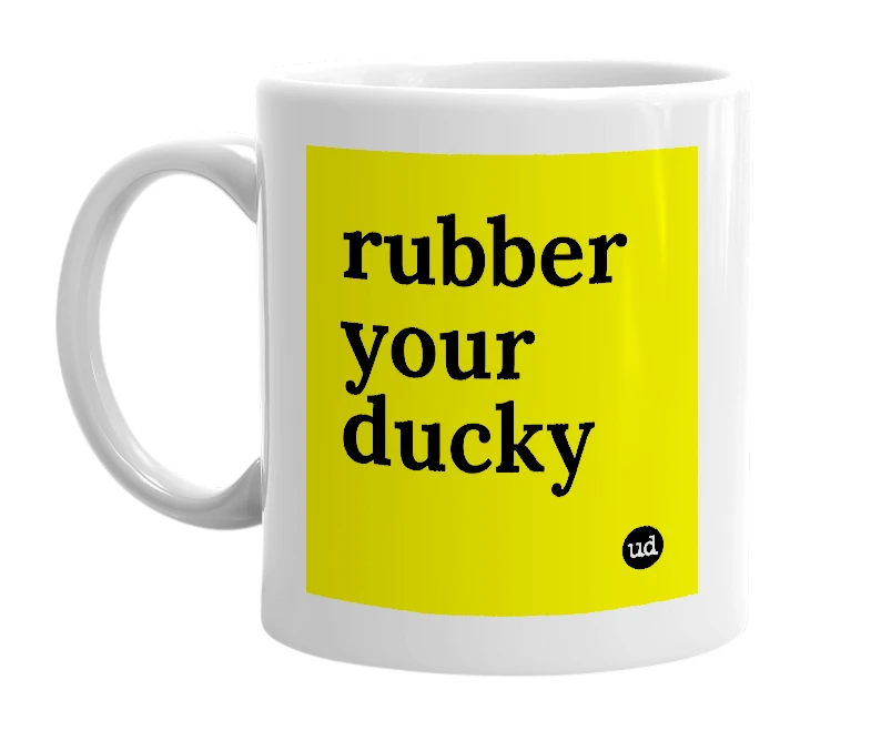 White mug with 'rubber your ducky' in bold black letters