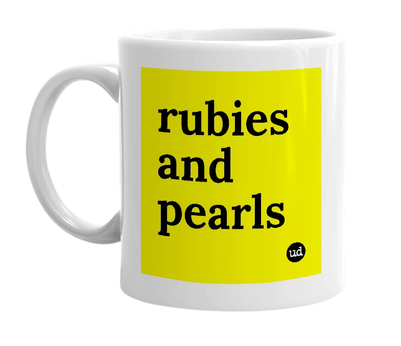 White mug with 'rubies and pearls' in bold black letters
