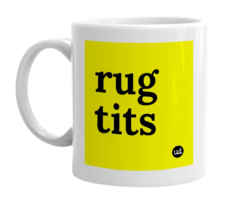 White mug with 'rug tits' in bold black letters