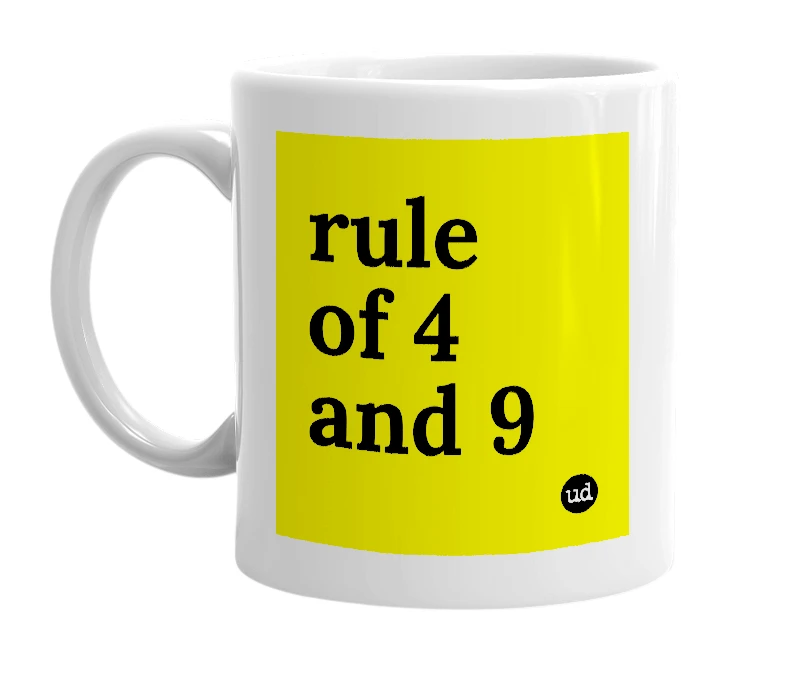 White mug with 'rule of 4 and 9' in bold black letters