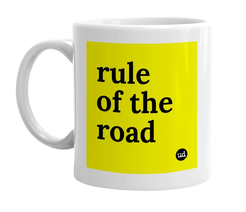 White mug with 'rule of the road' in bold black letters