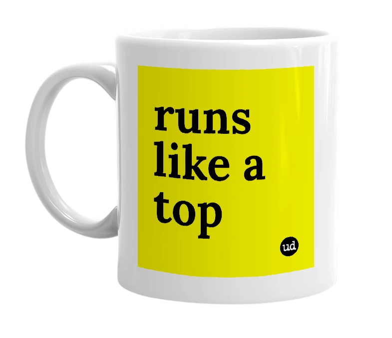 White mug with 'runs like a top' in bold black letters