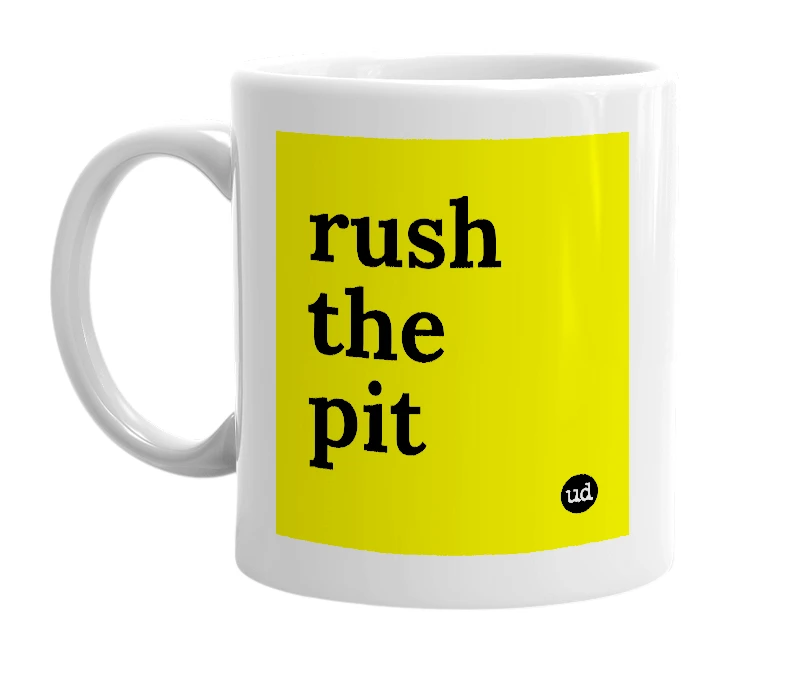 White mug with 'rush the pit' in bold black letters