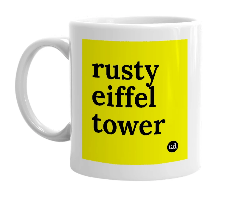 White mug with 'rusty eiffel tower' in bold black letters
