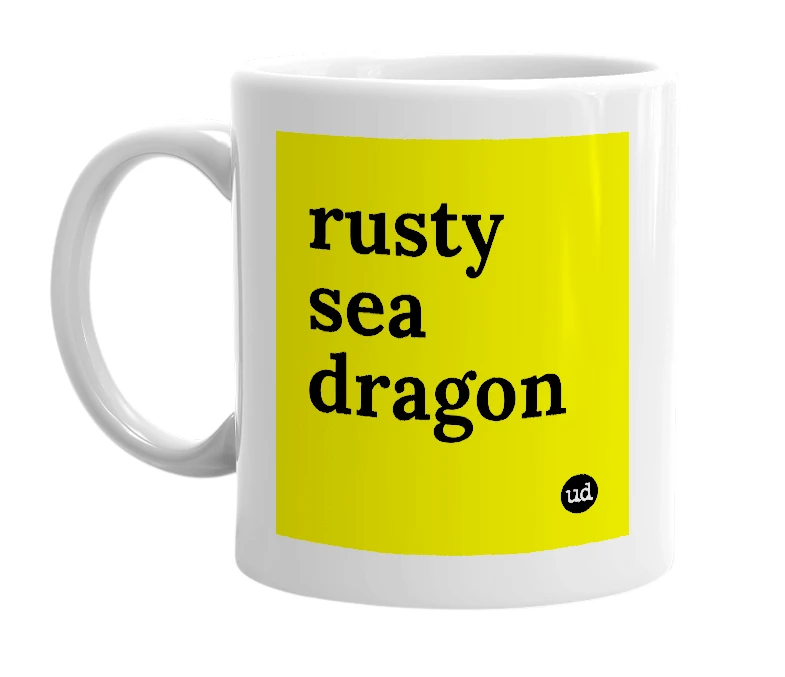 White mug with 'rusty sea dragon' in bold black letters