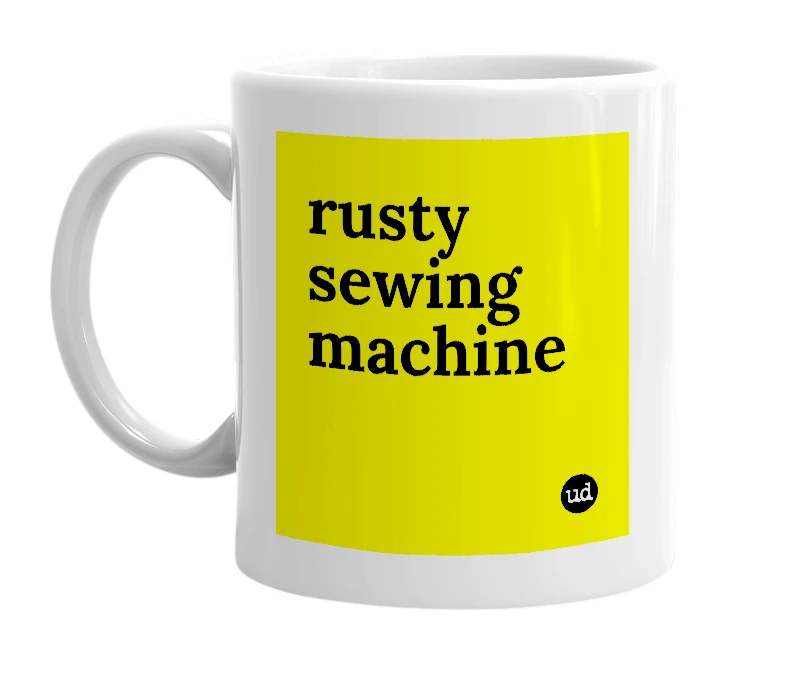 White mug with 'rusty sewing machine' in bold black letters