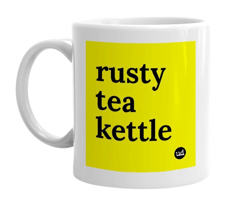 White mug with 'rusty tea kettle' in bold black letters