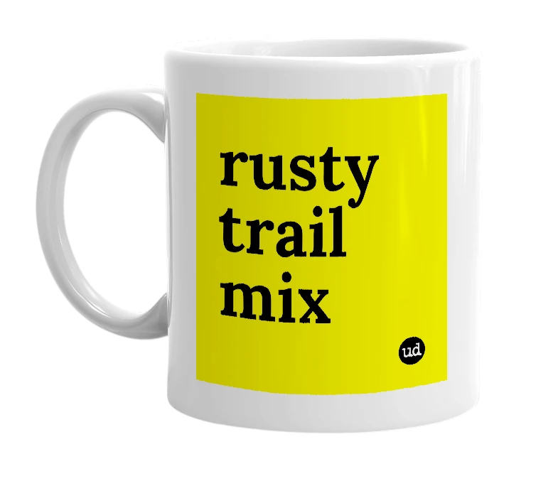 White mug with 'rusty trail mix' in bold black letters