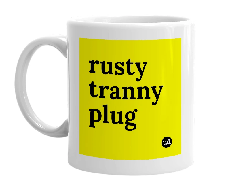 White mug with 'rusty tranny plug' in bold black letters