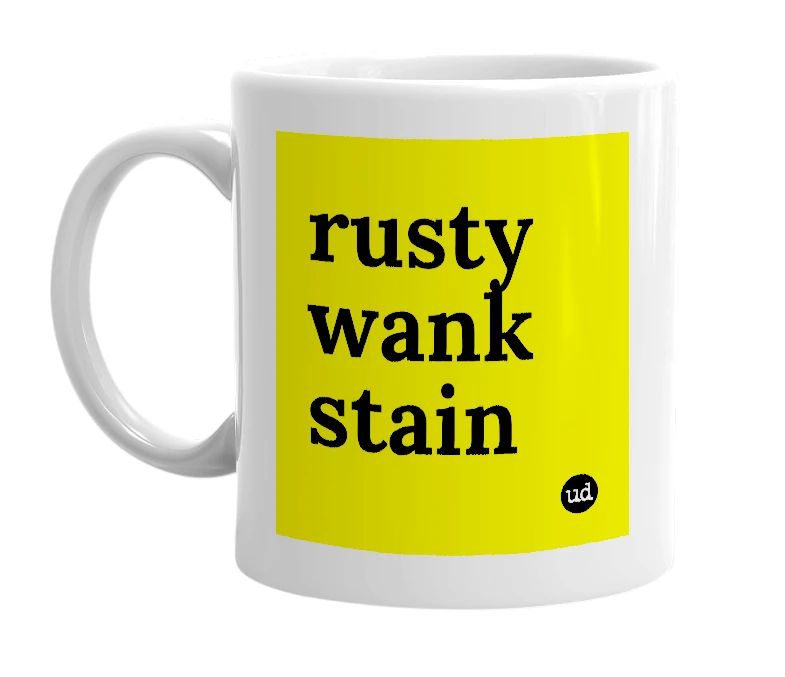 White mug with 'rusty wank stain' in bold black letters