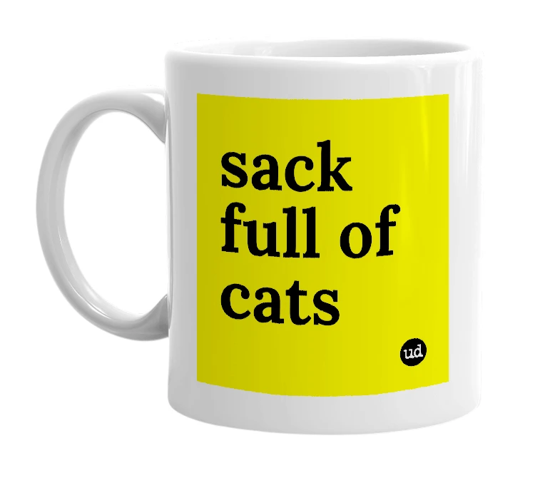 White mug with 'sack full of cats' in bold black letters