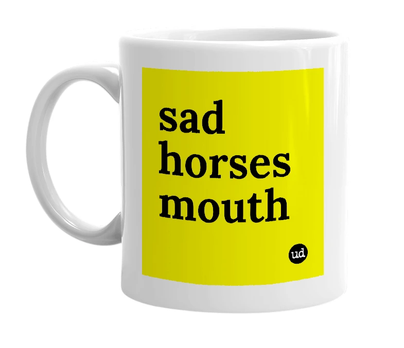 White mug with 'sad horses mouth' in bold black letters