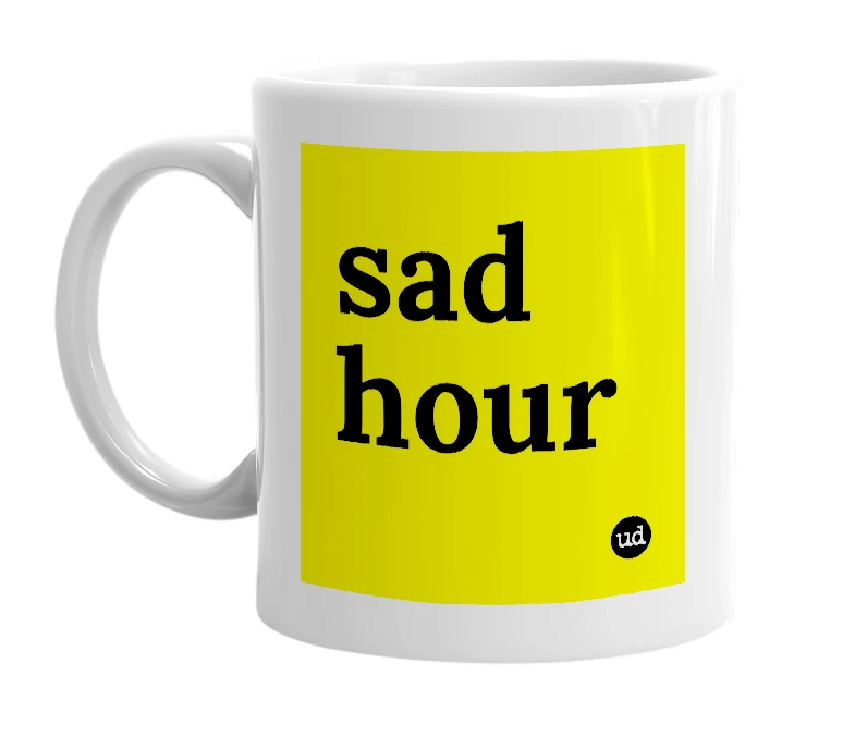 White mug with 'sad hour' in bold black letters