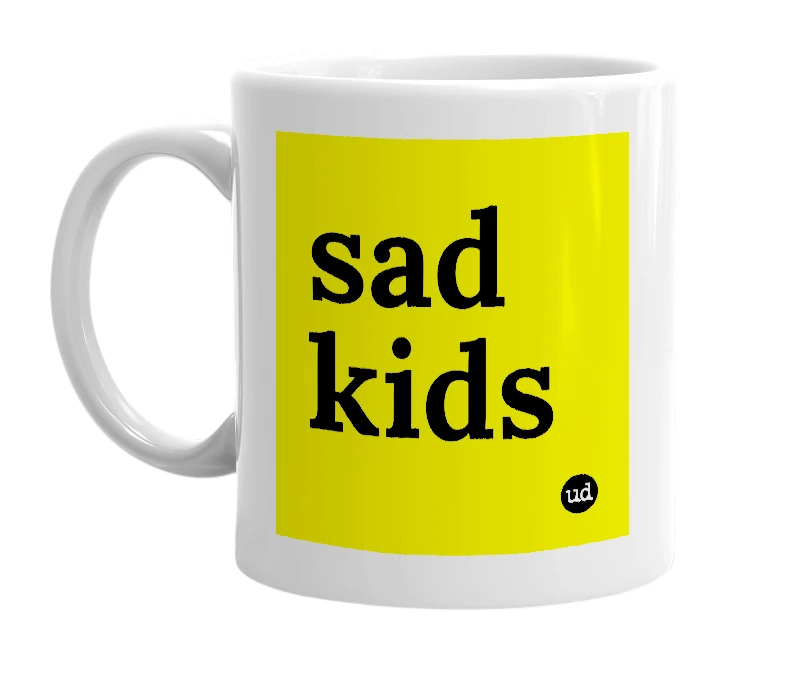 White mug with 'sad kids' in bold black letters