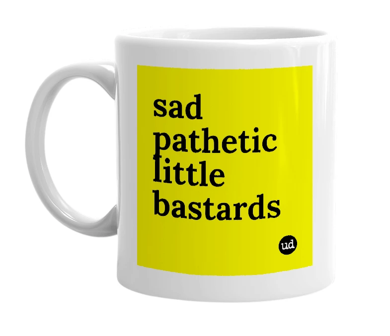 White mug with 'sad pathetic little bastards' in bold black letters