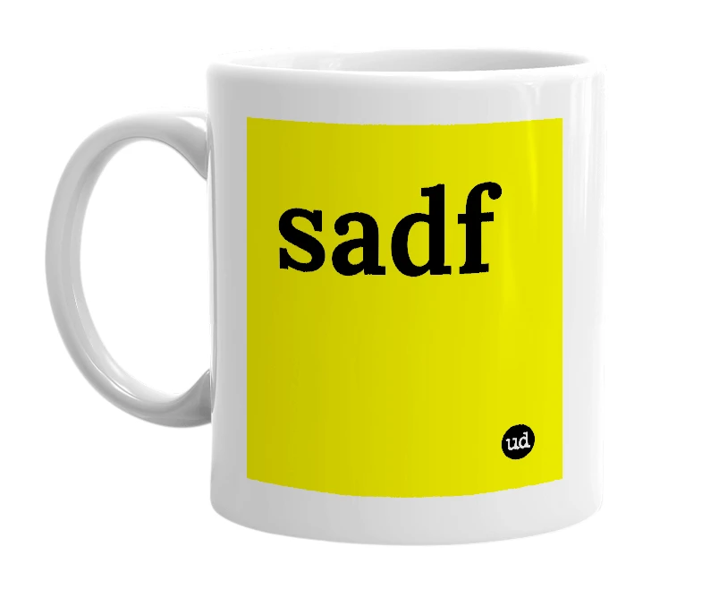 White mug with 'sadf' in bold black letters