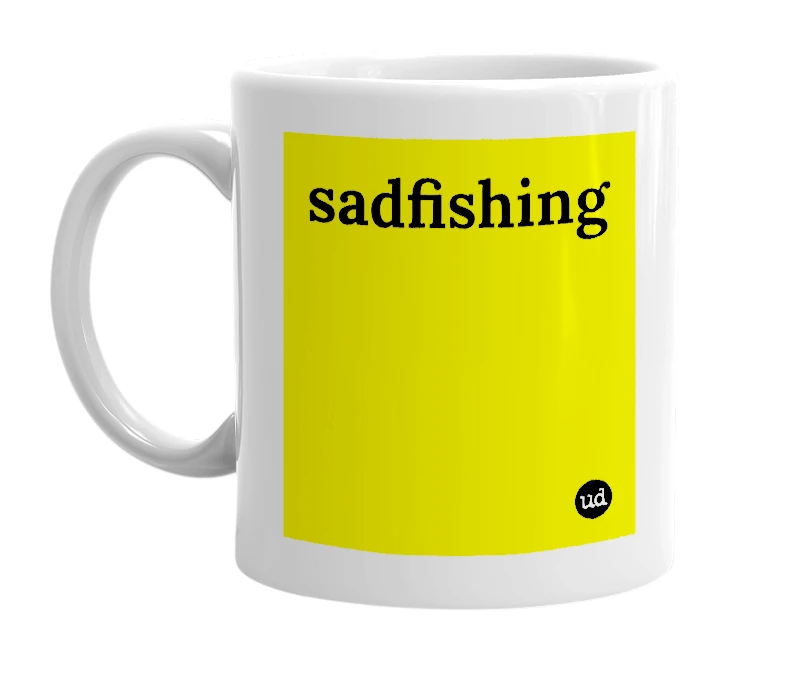 White mug with 'sadfishing' in bold black letters
