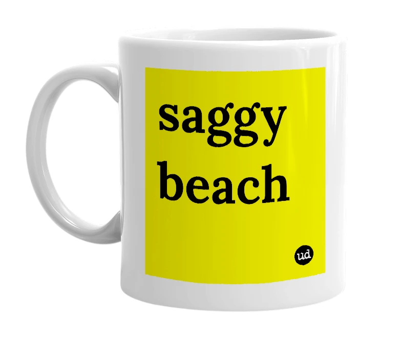 White mug with 'saggy beach' in bold black letters