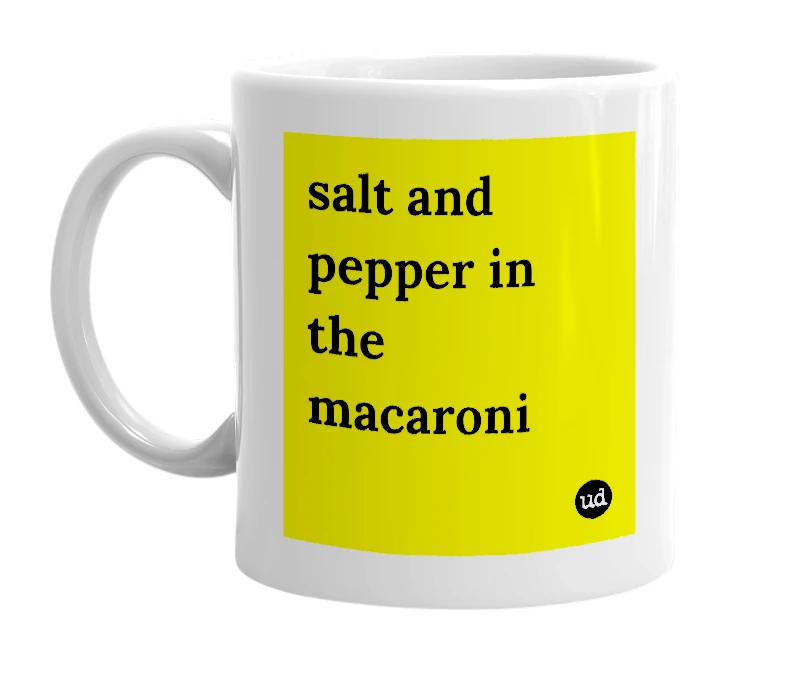 White mug with 'salt and pepper in the macaroni' in bold black letters