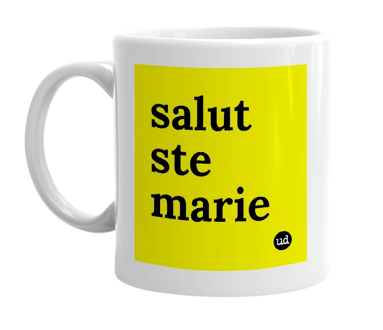 White mug with 'salut ste marie' in bold black letters