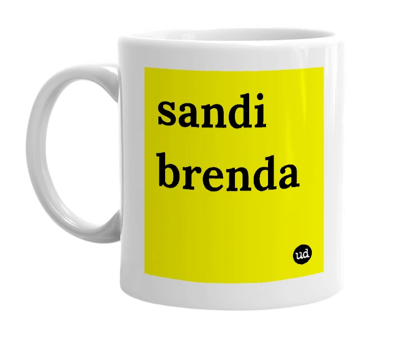 White mug with 'sandi brenda' in bold black letters