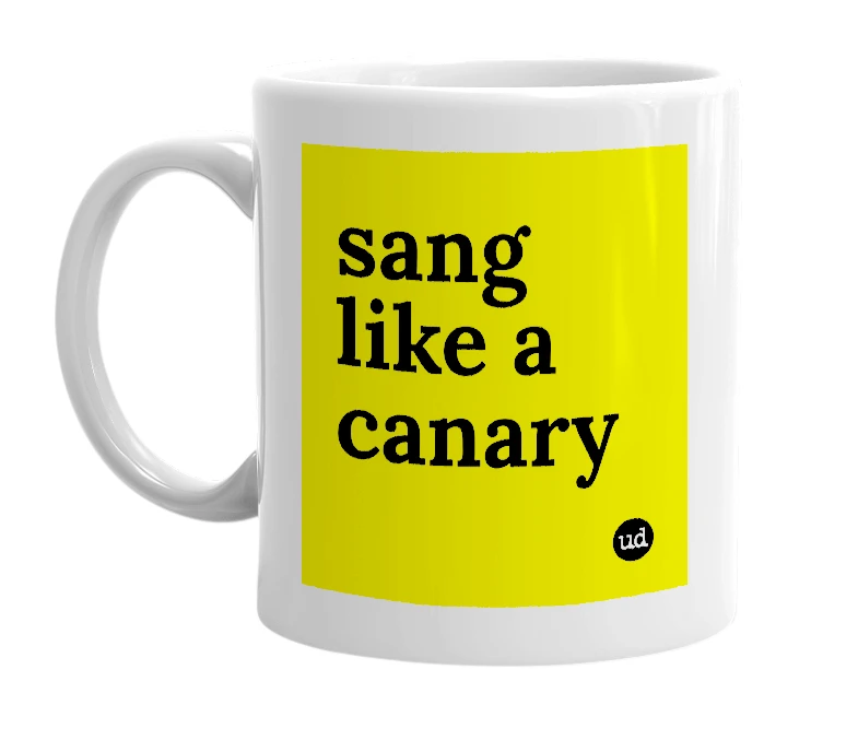 White mug with 'sang like a canary' in bold black letters