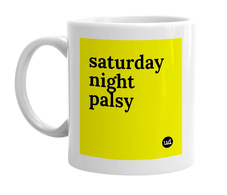 White mug with 'saturday night palsy' in bold black letters