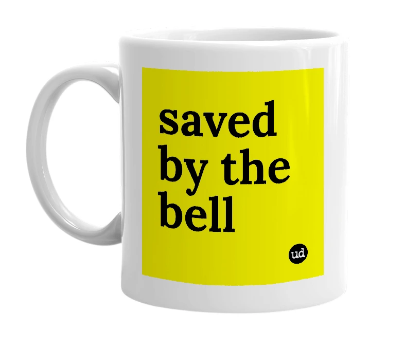 White mug with 'saved by the bell' in bold black letters