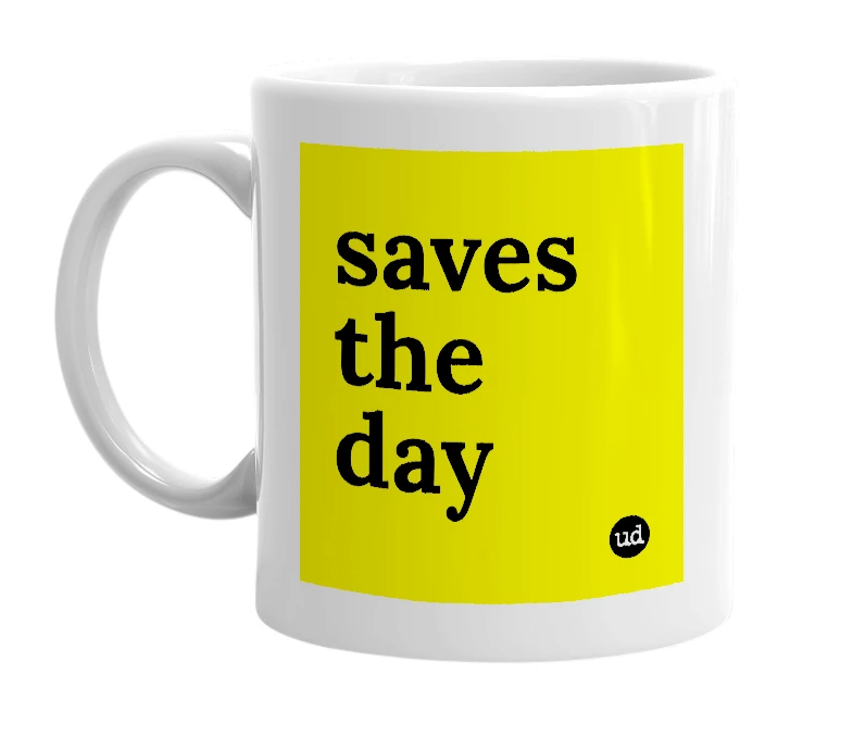 White mug with 'saves the day' in bold black letters