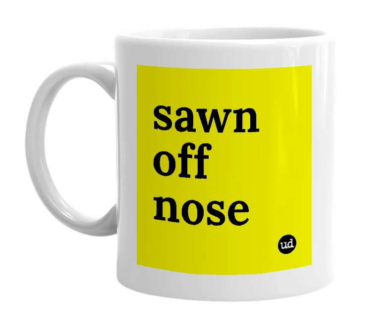 White mug with 'sawn off nose' in bold black letters