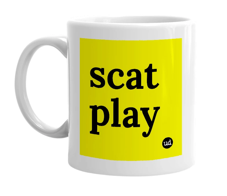 White mug with 'scat play' in bold black letters