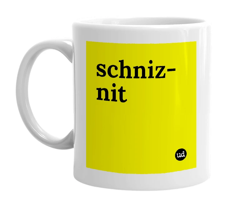 White mug with 'schniz-nit' in bold black letters