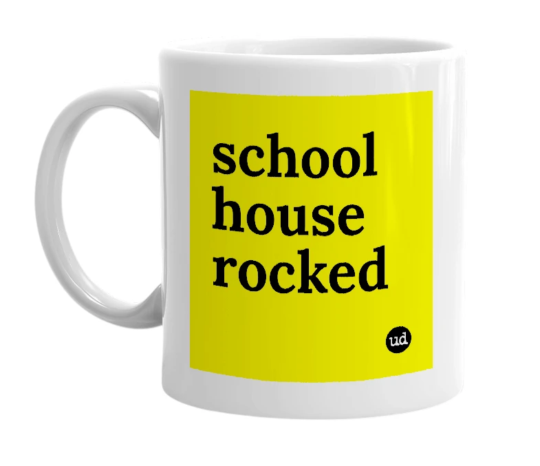 White mug with 'school house rocked' in bold black letters