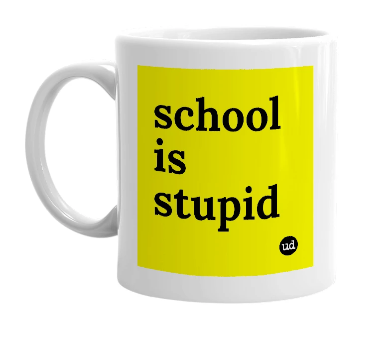 White mug with 'school is stupid' in bold black letters