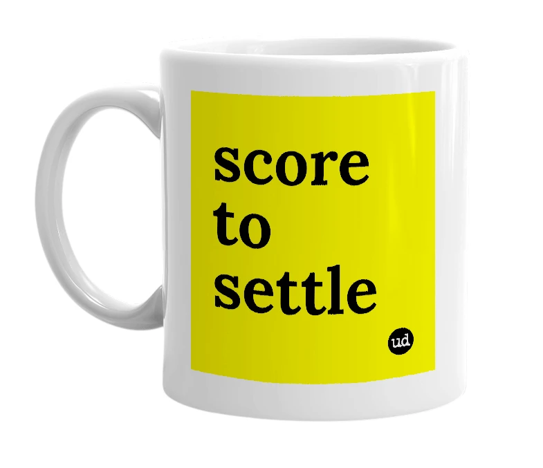 White mug with 'score to settle' in bold black letters
