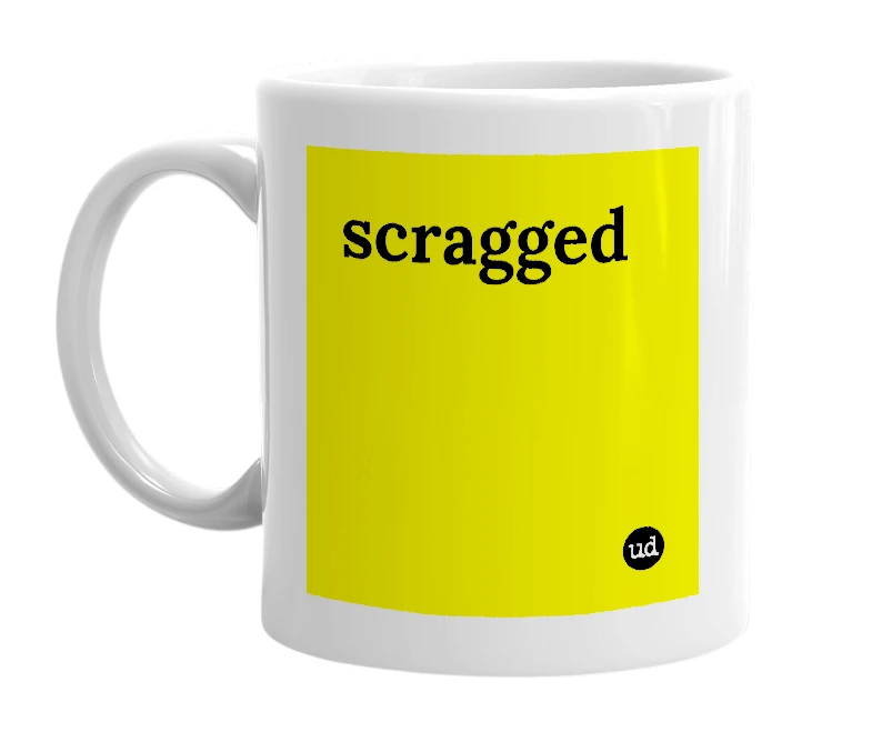 White mug with 'scragged' in bold black letters